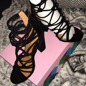 Black booties with straps, size 7.5